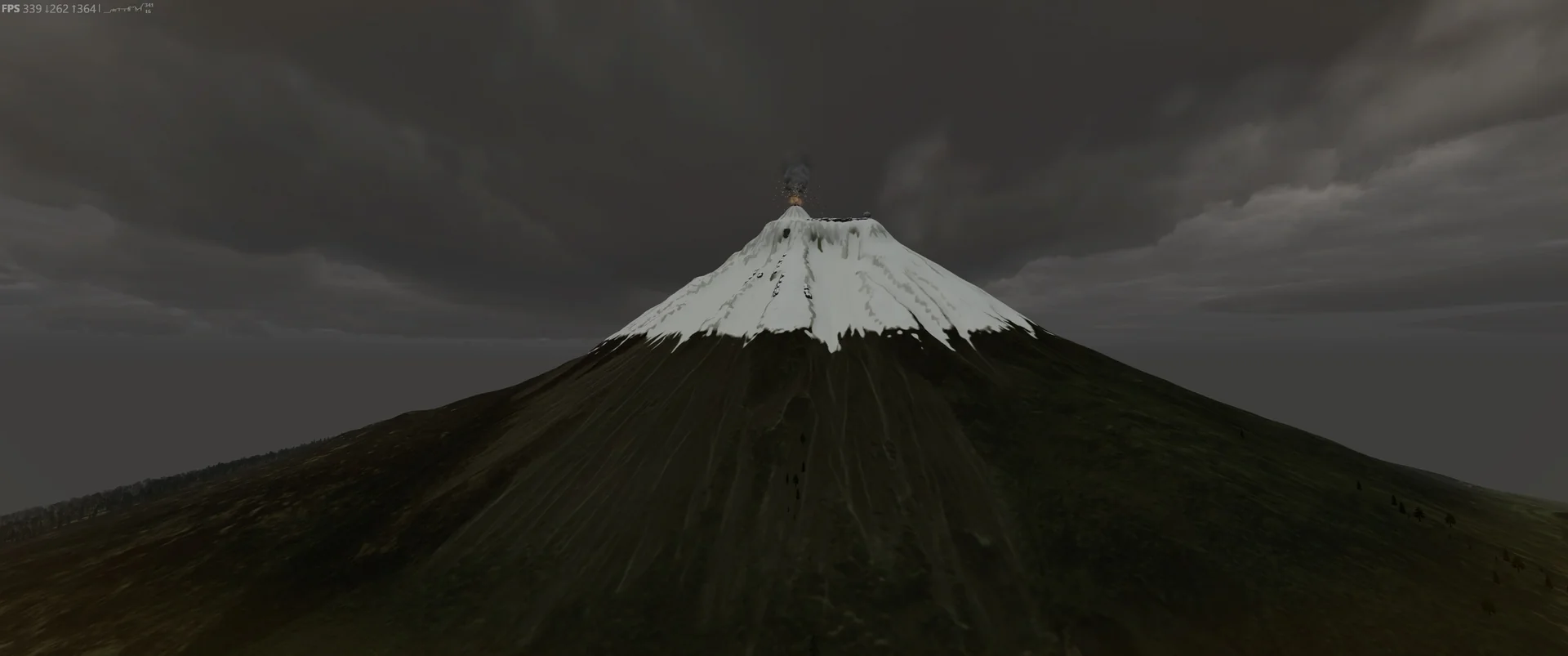 Snow-capped volcano against dark clouds